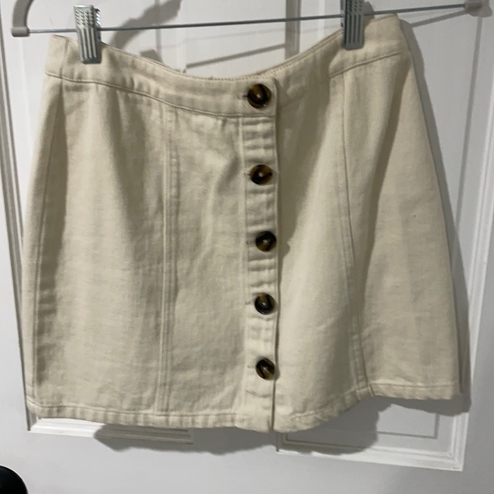 white denim skirt with buttons